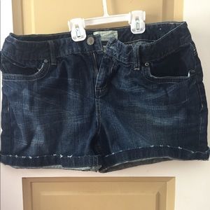 Jean shorts with distressed hem line.